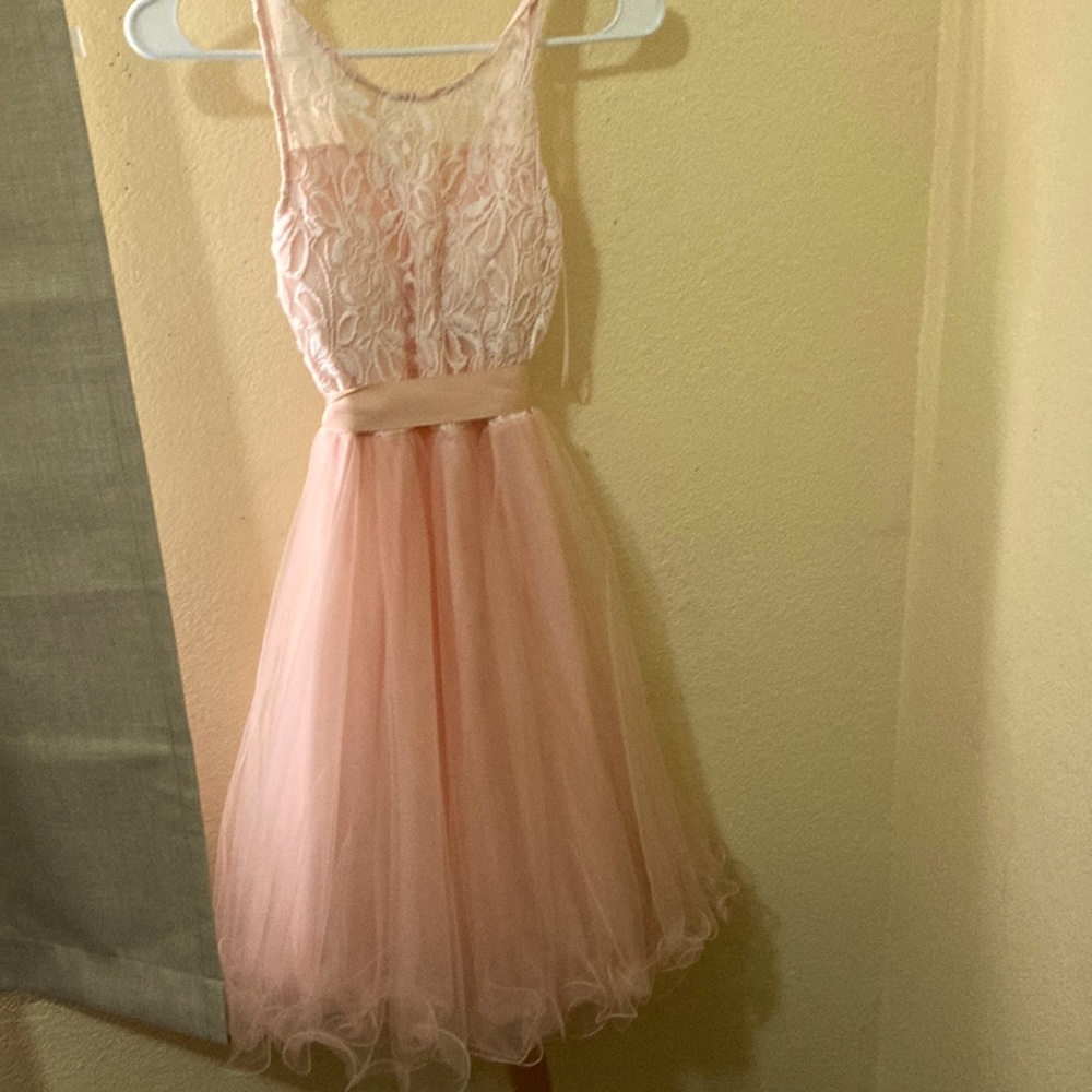 In good condition only worn one time no holes or cuts